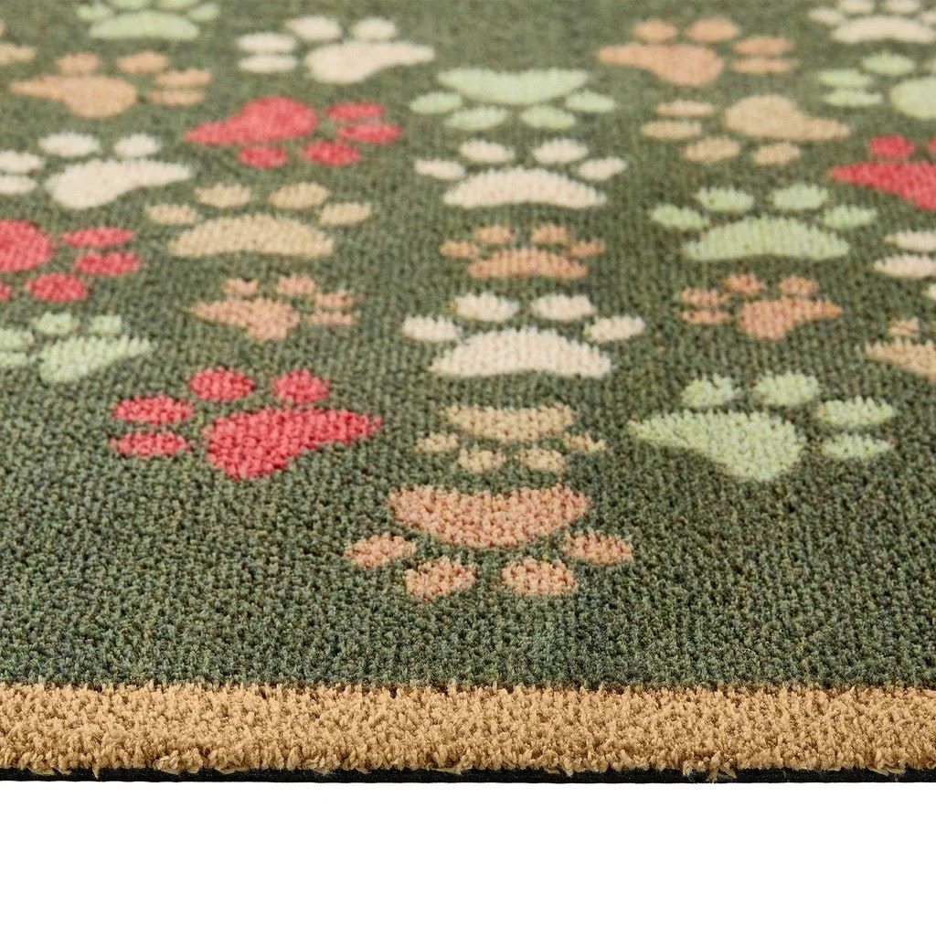 Detaljbilde av Hug Rug Paws for Love med fargerike potetrykk på grønn bakgrunn