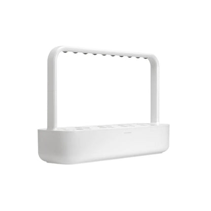 Click & Grow Smart Garden 9 i hvit – automatisert innendørs kjøkkenhage med LED-vekstlys og selvvanningssystem.