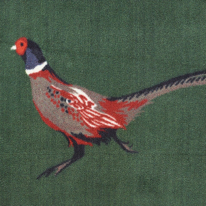 Detaljbilde av Hug Rug Pheasant Green med vevd fasanmotiv på grønn bakgrunn