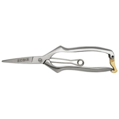 Messinglås som holder blomstersaksen lukket